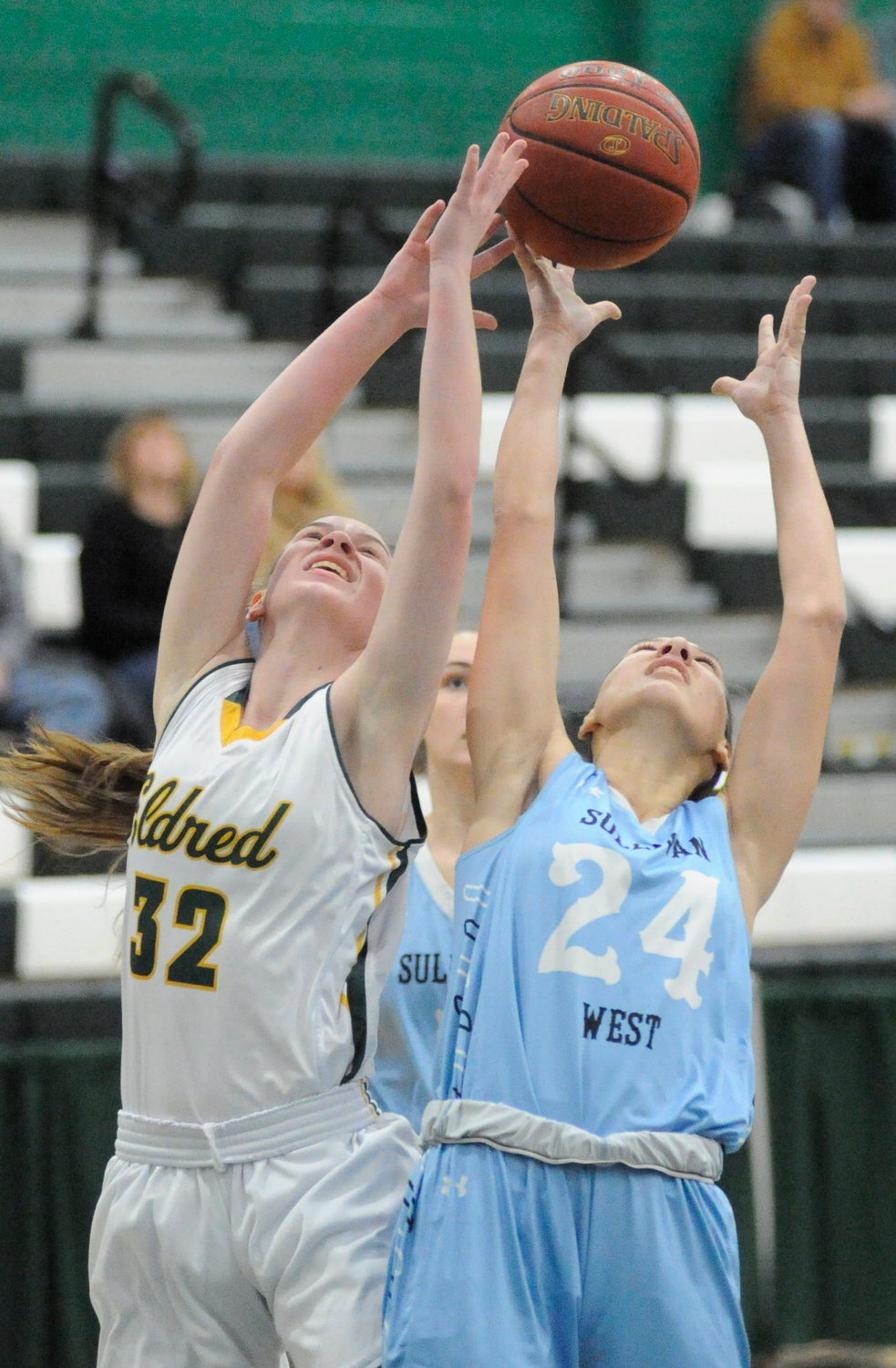 Reach for the moon. Eldred’s Molly McKerrell and Sullivan West’s Anna Bernas.